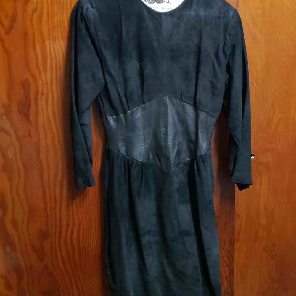 SADE AND leather dress¹